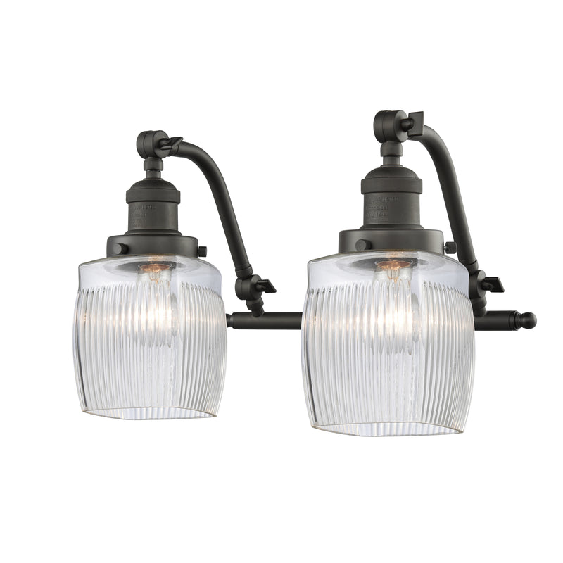 Colton Bath Vanity Light shown in the Oil Rubbed Bronze finish with a Clear Halophane shade