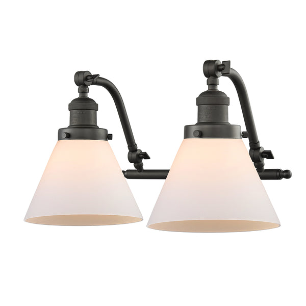 Cone Bath Vanity Light shown in the Oil Rubbed Bronze finish with a Matte White shade