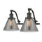 Cone Bath Vanity Light shown in the Oil Rubbed Bronze finish with a Plated Smoke shade