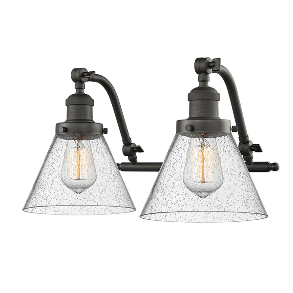 Cone Bath Vanity Light shown in the Oil Rubbed Bronze finish with a Seedy shade