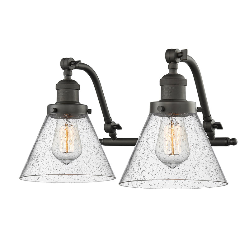 Cone Bath Vanity Light shown in the Oil Rubbed Bronze finish with a Seedy shade