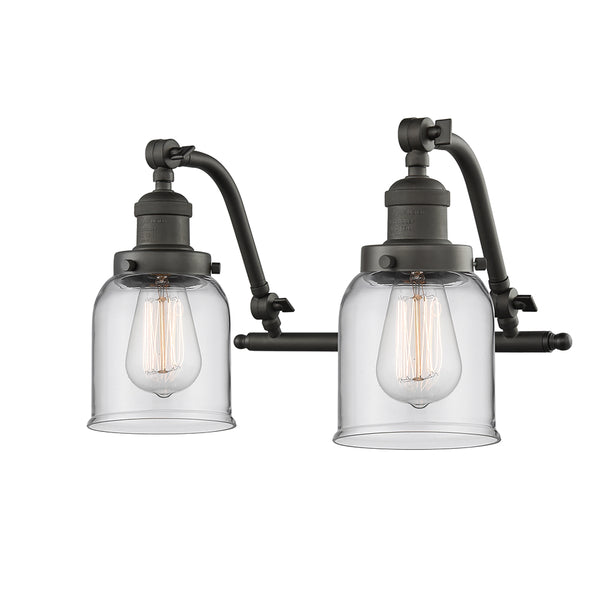 Bell Bath Vanity Light shown in the Oil Rubbed Bronze finish with a Clear shade