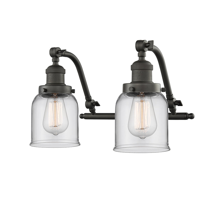Bell Bath Vanity Light shown in the Oil Rubbed Bronze finish with a Clear shade