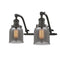 Bell Bath Vanity Light shown in the Oil Rubbed Bronze finish with a Plated Smoke shade