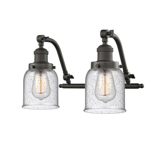 Bell Bath Vanity Light shown in the Oil Rubbed Bronze finish with a Seedy shade