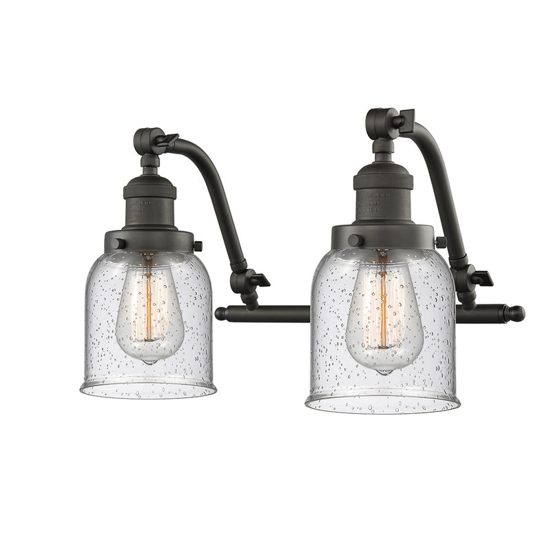 Bell Bath Vanity Light shown in the Oil Rubbed Bronze finish with a Seedy shade