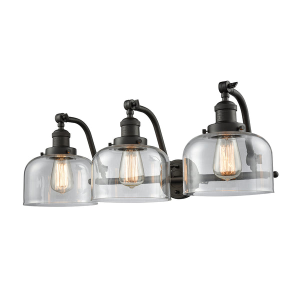 Bell Bath Vanity Light shown in the Oil Rubbed Bronze finish with a Clear shade