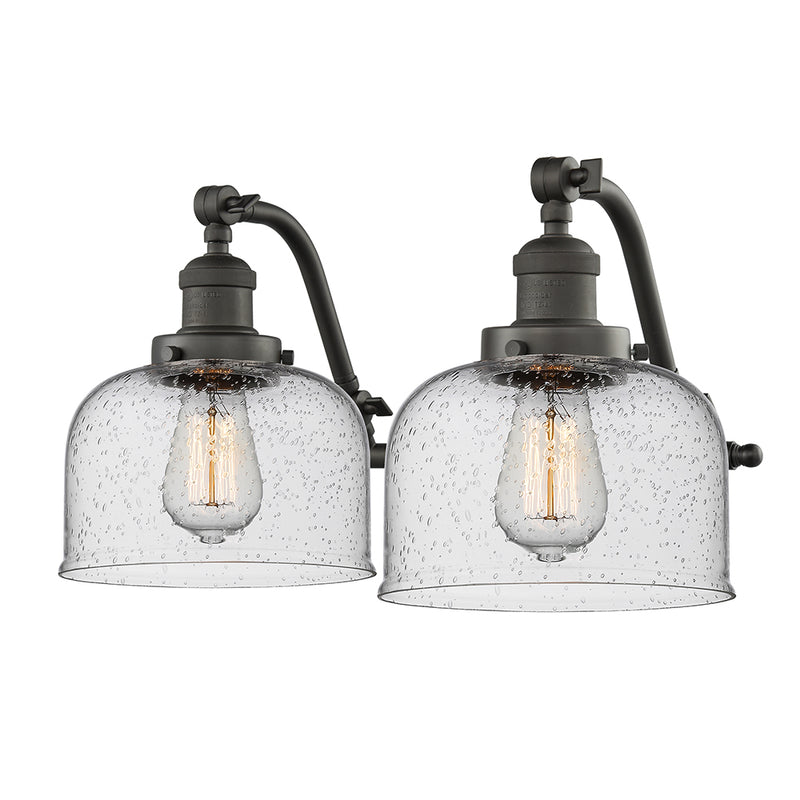 Bell Bath Vanity Light shown in the Oil Rubbed Bronze finish with a Seedy shade
