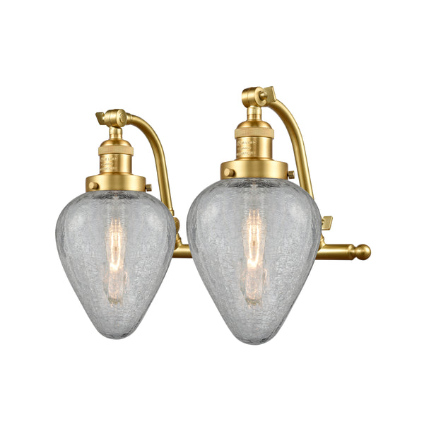 Geneseo Bath Vanity Light shown in the Satin Gold finish with a Clear Crackled shade