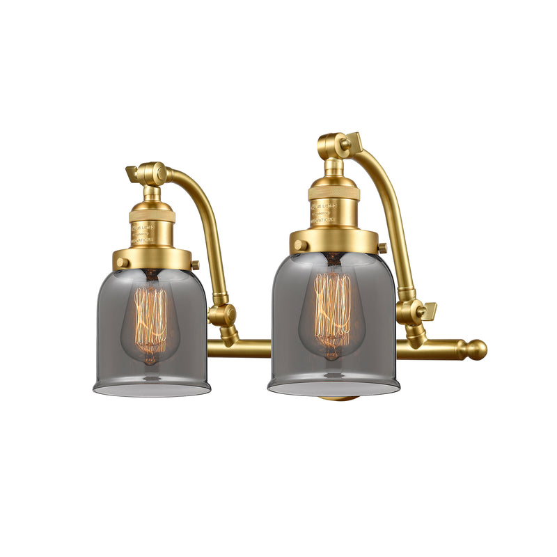 Bell Bath Vanity Light shown in the Satin Gold finish with a Plated Smoke shade