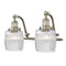 Colton Bath Vanity Light shown in the Brushed Satin Nickel finish with a Clear Halophane shade