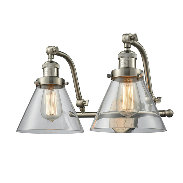 Cone Bath Vanity Light shown in the Brushed Satin Nickel finish with a Clear shade