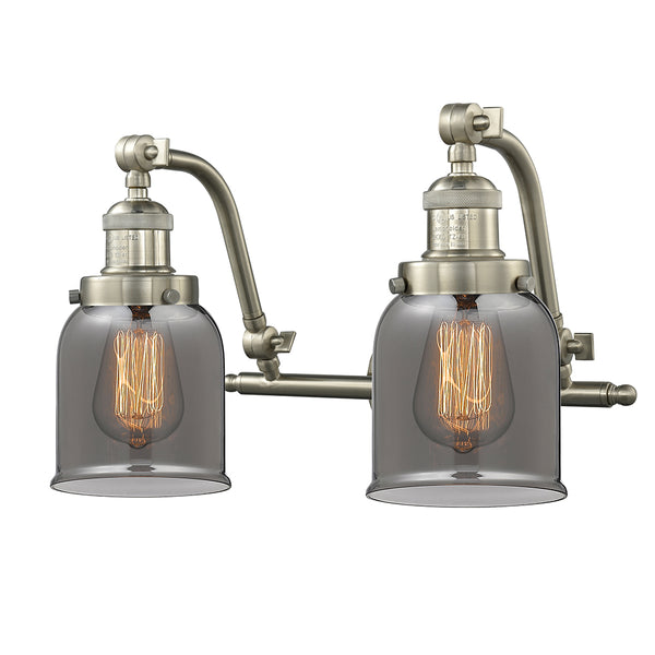 Bell Bath Vanity Light shown in the Brushed Satin Nickel finish with a Plated Smoke shade