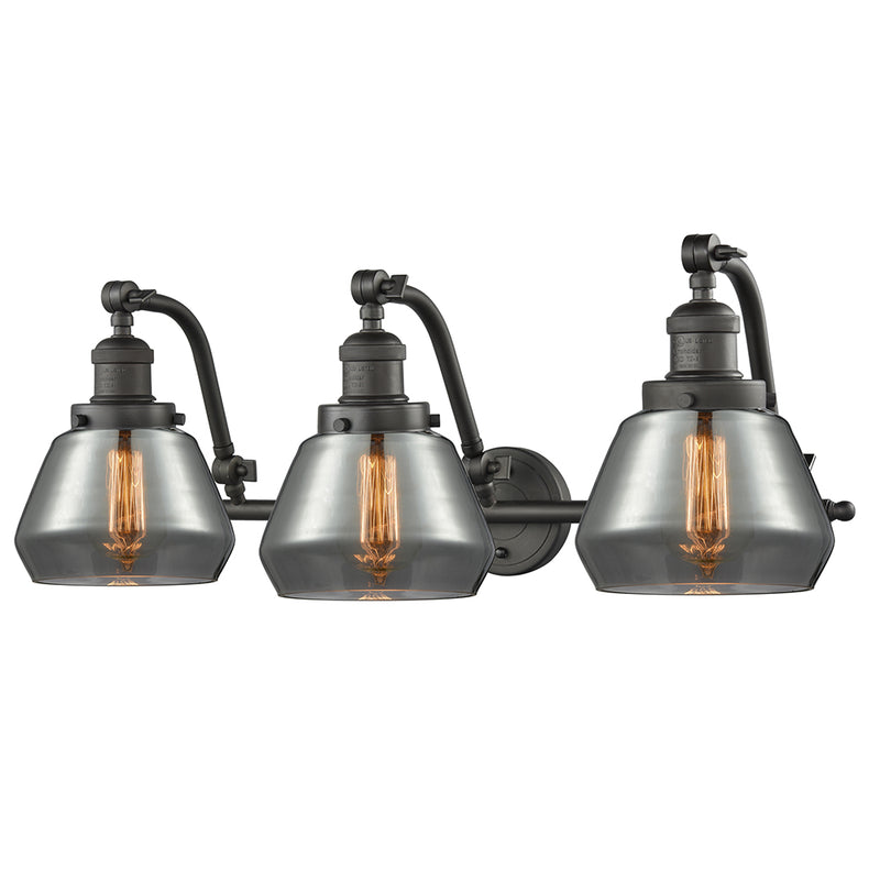 Fulton Bath Vanity Light shown in the Oil Rubbed Bronze finish with a Plated Smoke shade