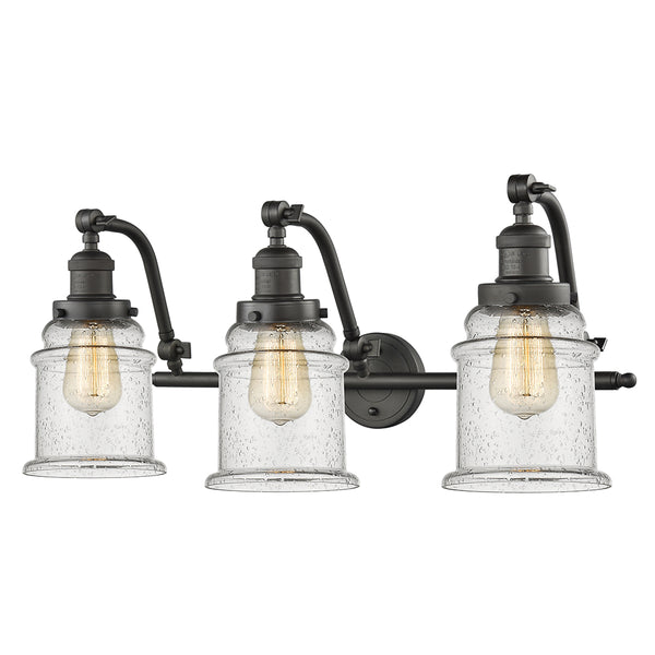 Canton Bath Vanity Light shown in the Oil Rubbed Bronze finish with a Seedy shade