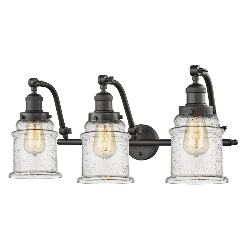 Canton Bath Vanity Light shown in the Oil Rubbed Bronze finish with a Seedy shade