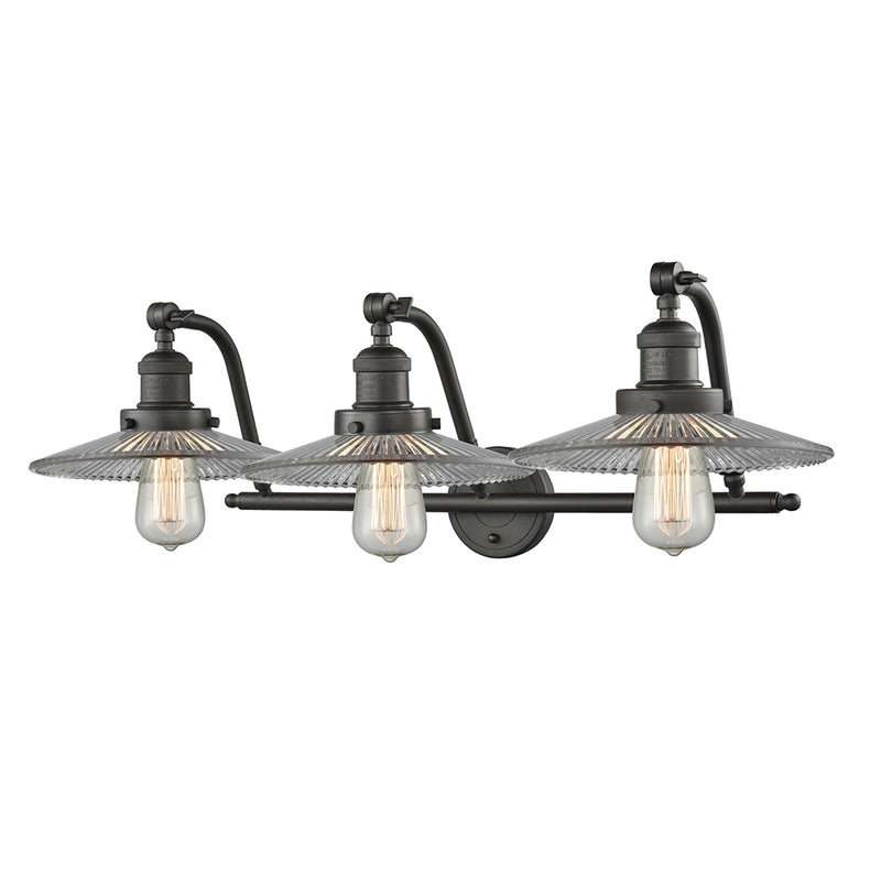 Halophane Bath Vanity Light shown in the Oil Rubbed Bronze finish with a Clear Halophane shade