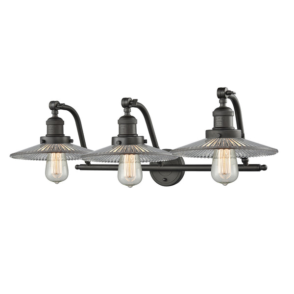 Halophane Bath Vanity Light shown in the Oil Rubbed Bronze finish with a Clear Halophane shade