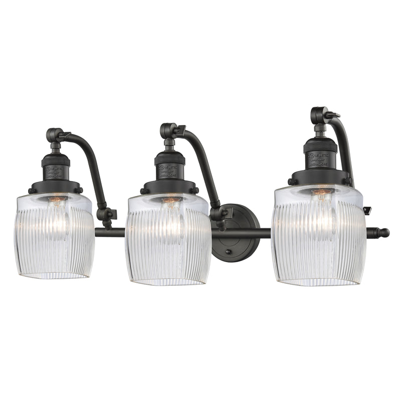 Colton Bath Vanity Light shown in the Oil Rubbed Bronze finish with a Clear Halophane shade