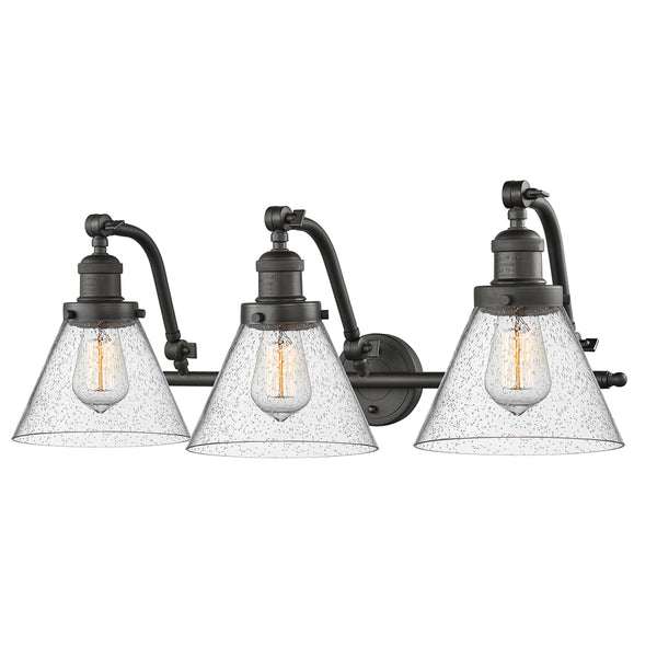 Cone Bath Vanity Light shown in the Oil Rubbed Bronze finish with a Seedy shade