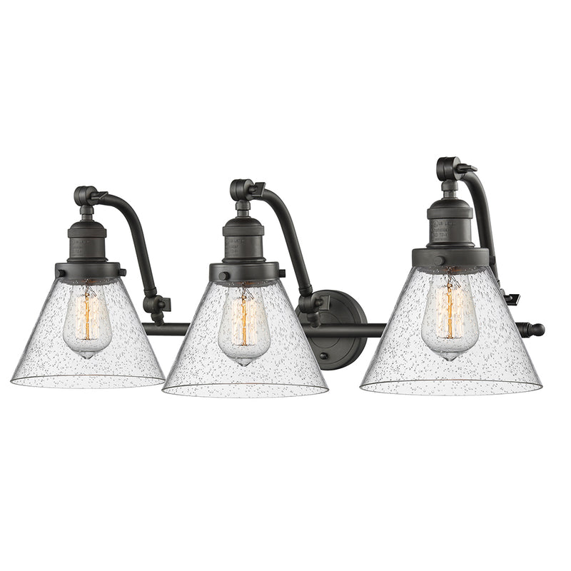 Cone Bath Vanity Light shown in the Oil Rubbed Bronze finish with a Seedy shade