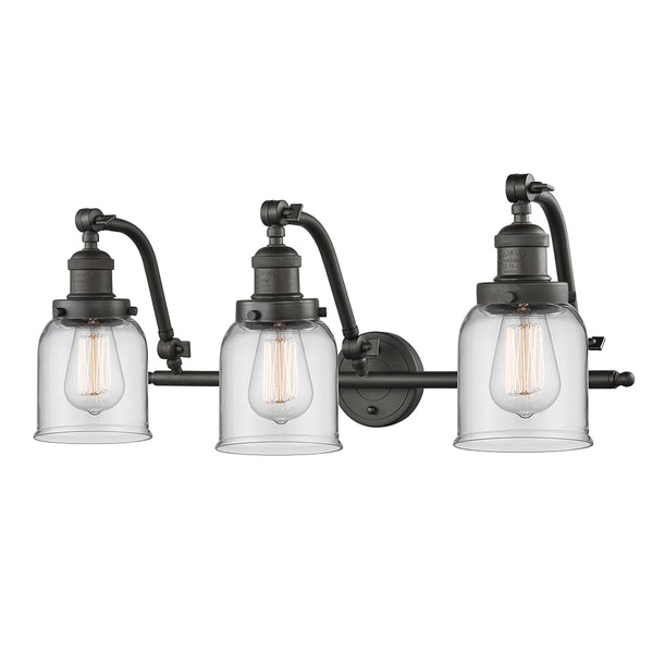 Bell Bath Vanity Light shown in the Oil Rubbed Bronze finish with a Clear shade