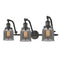 Bell Bath Vanity Light shown in the Oil Rubbed Bronze finish with a Plated Smoke shade