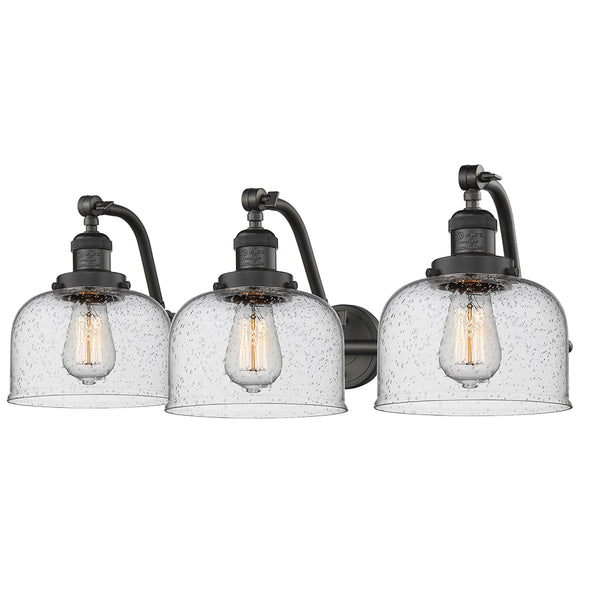Bell Bath Vanity Light shown in the Oil Rubbed Bronze finish with a Seedy shade