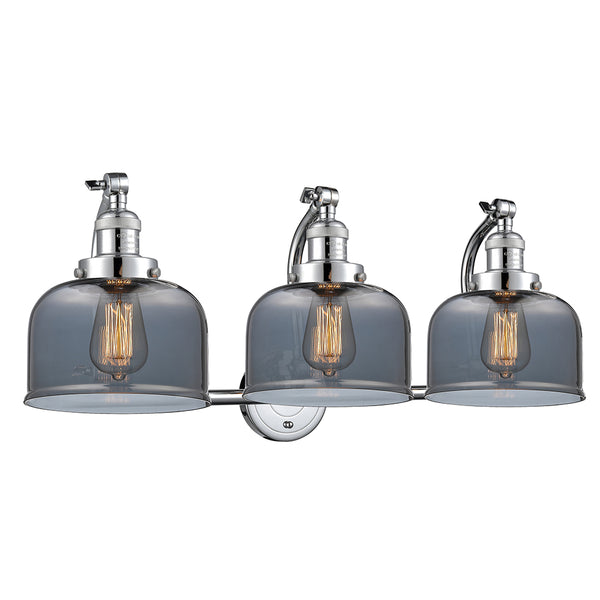 Bell Bath Vanity Light shown in the Polished Chrome finish with a Plated Smoke shade