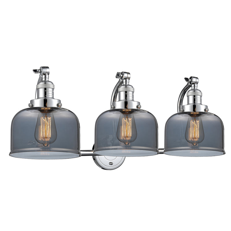Bell Bath Vanity Light shown in the Polished Chrome finish with a Plated Smoke shade