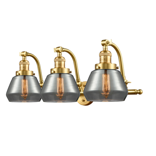 Fulton Bath Vanity Light shown in the Satin Gold finish with a Plated Smoke shade
