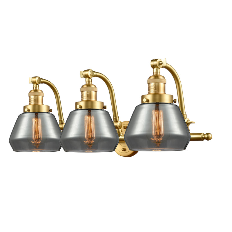 Fulton Bath Vanity Light shown in the Satin Gold finish with a Plated Smoke shade