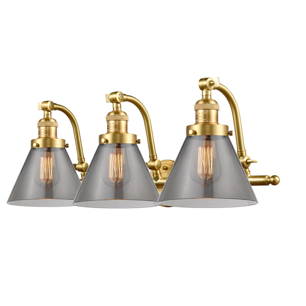 Cone Bath Vanity Light shown in the Satin Gold finish with a Plated Smoke shade