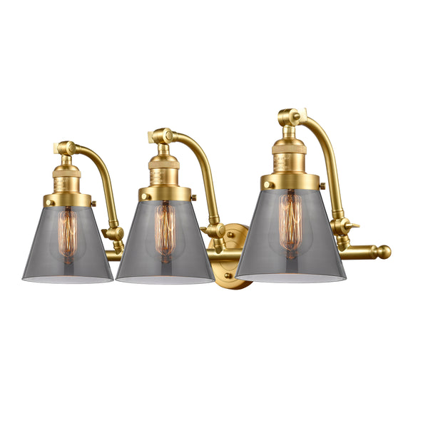 Cone Bath Vanity Light shown in the Satin Gold finish with a Plated Smoke shade