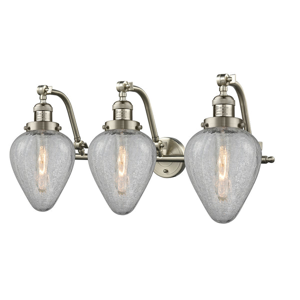 Geneseo Bath Vanity Light shown in the Brushed Satin Nickel finish with a Clear Crackled shade
