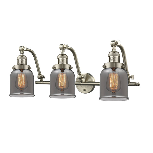 Bell Bath Vanity Light shown in the Brushed Satin Nickel finish with a Plated Smoke shade