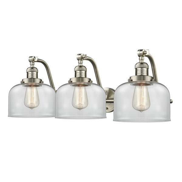 Bell Bath Vanity Light shown in the Brushed Satin Nickel finish with a Clear shade