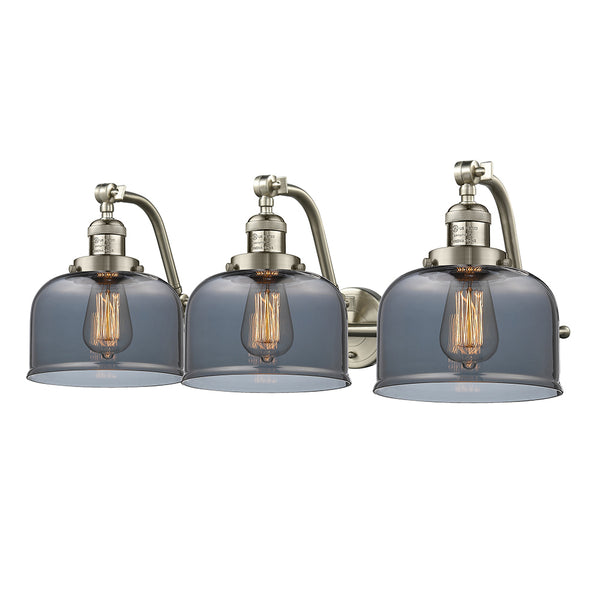 Bell Bath Vanity Light shown in the Brushed Satin Nickel finish with a Plated Smoke shade