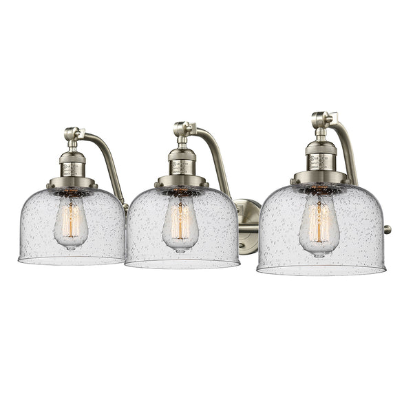 Bell Bath Vanity Light shown in the Brushed Satin Nickel finish with a Seedy shade
