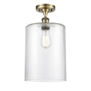 Cobbleskill Semi-Flush Mount shown in the Antique Brass finish with a Clear shade