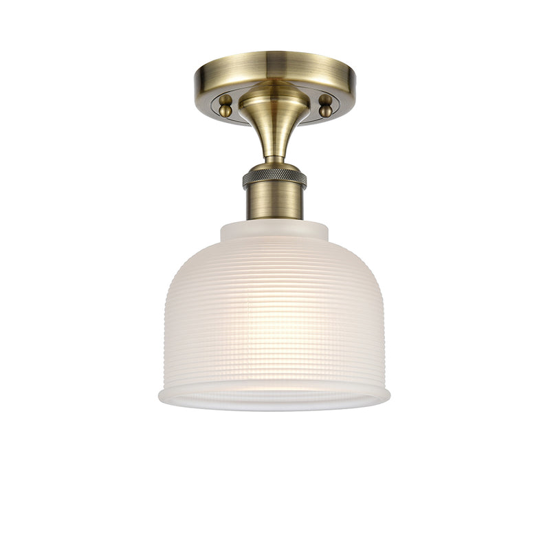 Dayton Semi-Flush Mount shown in the Antique Brass finish with a White shade