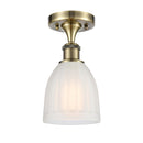 Brookfield Semi-Flush Mount shown in the Antique Brass finish with a White shade