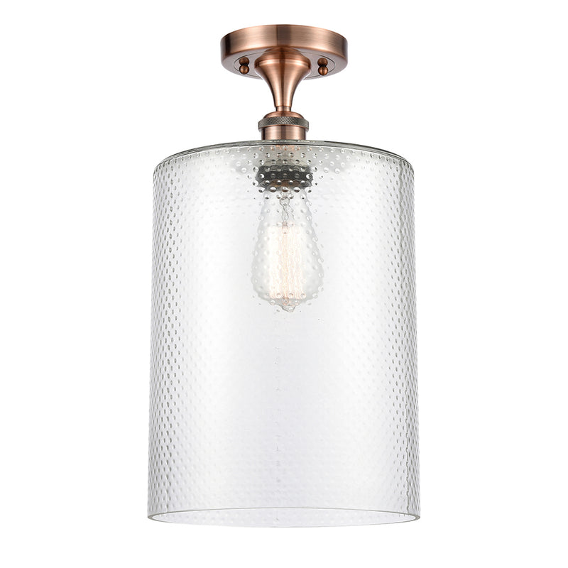 Cobbleskill Semi-Flush Mount shown in the Antique Copper finish with a Clear shade