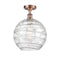 Deco Swirl Semi-Flush Mount shown in the Antique Copper finish with a Clear shade