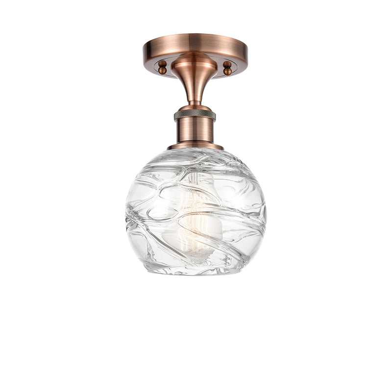 Deco Swirl Semi-Flush Mount shown in the Antique Copper finish with a Clear shade