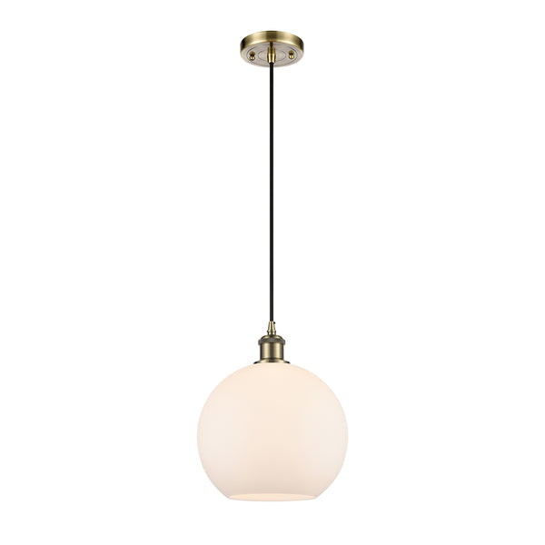 Athens Mini Pendant shown in the Antique Brass finish with a Matte White shade
