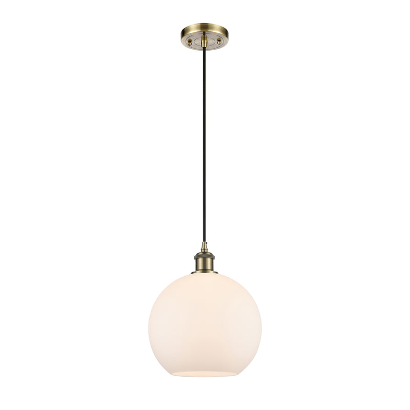 Athens Mini Pendant shown in the Antique Brass finish with a Matte White shade