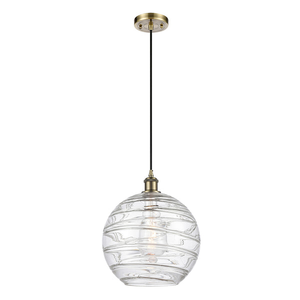 Deco Swirl Mini Pendant shown in the Antique Brass finish with a Clear shade