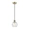 Deco Swirl Mini Pendant shown in the Antique Brass finish with a Clear shade