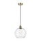 Athens Mini Pendant shown in the Antique Brass finish with a Clear shade